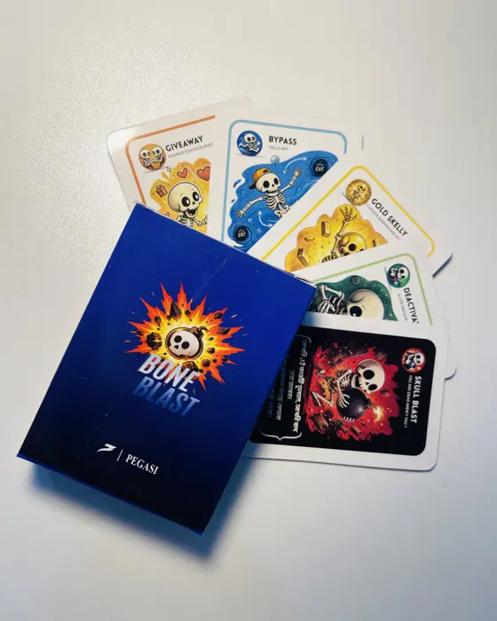 The Bone Blast box with Giveaway, Bypass, Gold Skelly, Deactivate and Skull Blast cards fanned out behind it