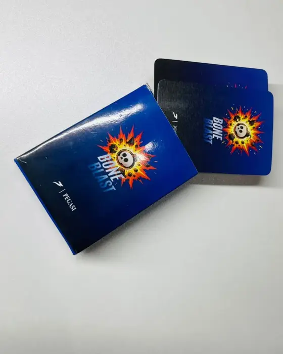 The Bone Blast box with two cards sliding out