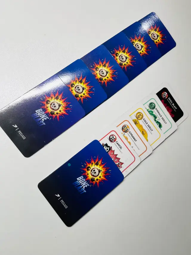 Bone Blast card backs with the blue skull explosion design